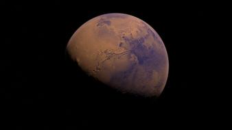 half shadowed Mars, planet in Space