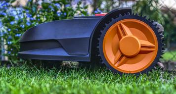 autonomous robot mower on the lawn