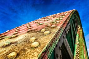 rusty colorful Arch of Bridge at blue sky