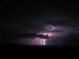 flash of lightning in the sky at night