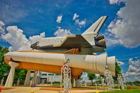 space shuttle on a stand on the ground