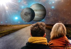 couple on the road against the background of planets and galaxies