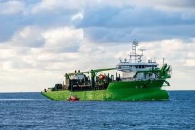 green Dredging Ship in sea