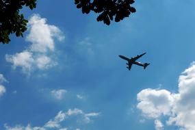 distant view of airplane at sky