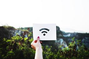 wi-fi symbol in hand