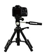 sony slt-a58 on a tripod on a white background
