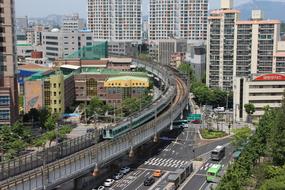 Subway, among the colorful buildings and green trees, in Seoul, Republic of Korea