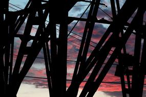 crane structure with purple pink clouds