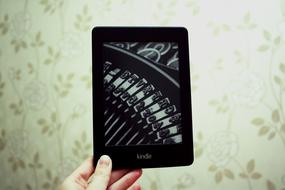 image of typewriter letters on tablet screen