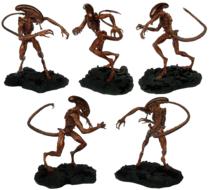 Collectible figures of the alien, at white background