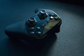 photo of a black gaming wireless joystick