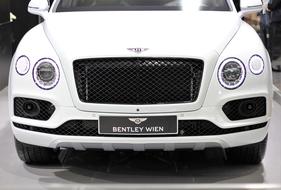the front of a white Bentley car