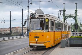 vintage yellow Tram in city, hungary, budapest