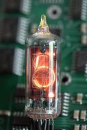 Nixie Tube Indicator close-up on blurred background