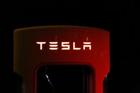 Tesla logo on the heater in the car