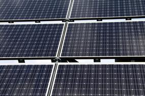 Shiny, black solar cells in light