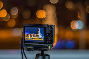 photo of the night city on the camera screen