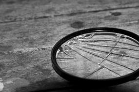 black and white photo of a broken magnifier