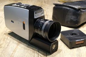 black retro video camera and case on the table