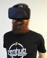 man with a red beard in virtual reality glasses