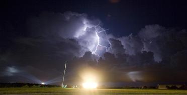 rocket launch into stormy sky