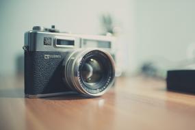 G Yashica Camera on the table in a blurred background