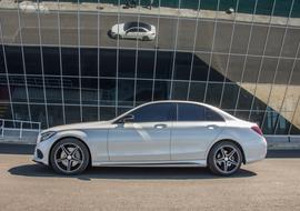 Mercedes Car reflected on the facade