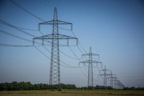 power lines against a blue evening sky