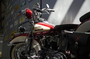 photo of a red-white retro harley davidson motorcycle
