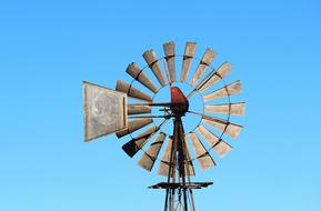 windmill against the background of the summer blue sky