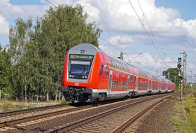 double-decker cars on the railway on a sunny day