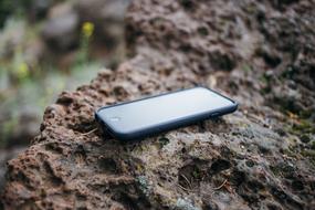 Iphone Mobile on stone