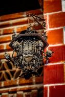 Vintage Rusty Lamp and brick wall