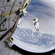 photo of astronaut in outer space