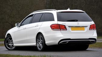 Mercedes-Benz Car white on road