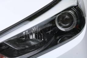 xenon spotlight of a white car