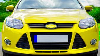 front of yellow auto ford close up