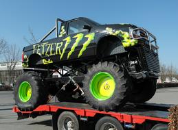 stunt pickup on a tow truck