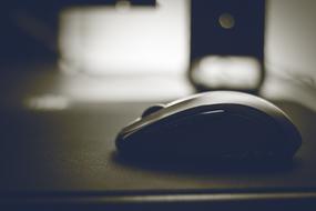 computer mouse close-up in a blurred background