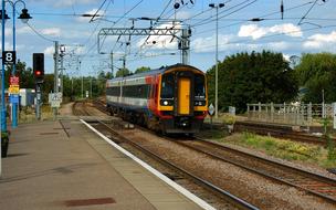 train arrival at a train station in Britain