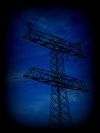 Silhouette of the power supply at blue sky background