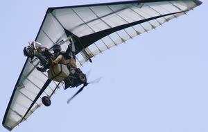 Close-up of a delta flyer, at background with beautiful, blue sky