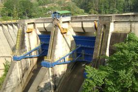 Hydro electric dam, among the beautiful, green forest in Costa Rica