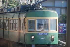 Enoden green Electric Train on station, japan