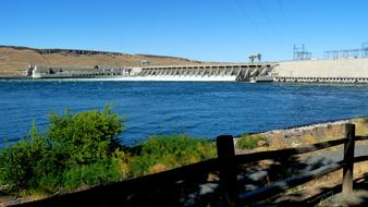 Beautiful blue water and dam, with the hill on the shore in McNary, Oregon, USA