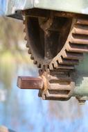 Close-up of the old, colorful metal transmission with the gears