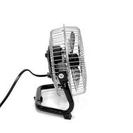 Black fan, with the wire, on the white surface