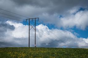 power lines on Green Grass Field