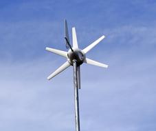 circular wind turbine with white blades