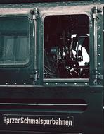Old, retro steam locomotive with the open window